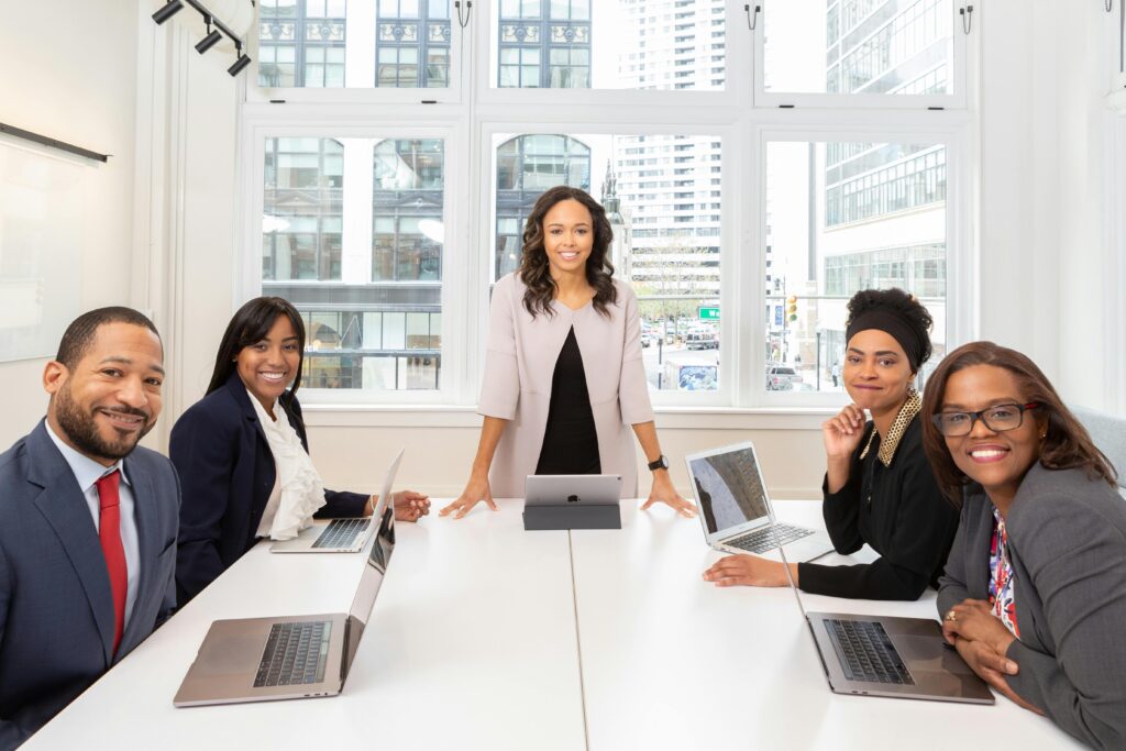 A young lady taking a meeting showing leadership skills.